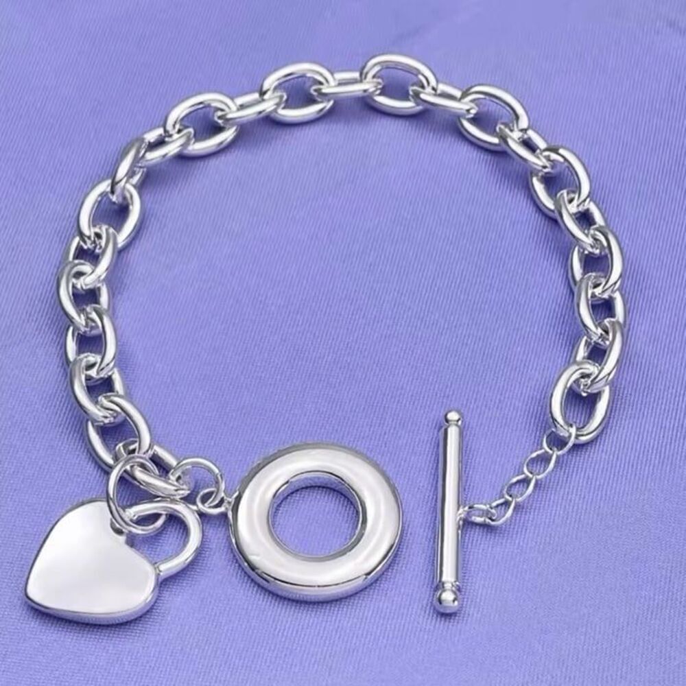 The Toggle Heart chain link sterling silver bracelet